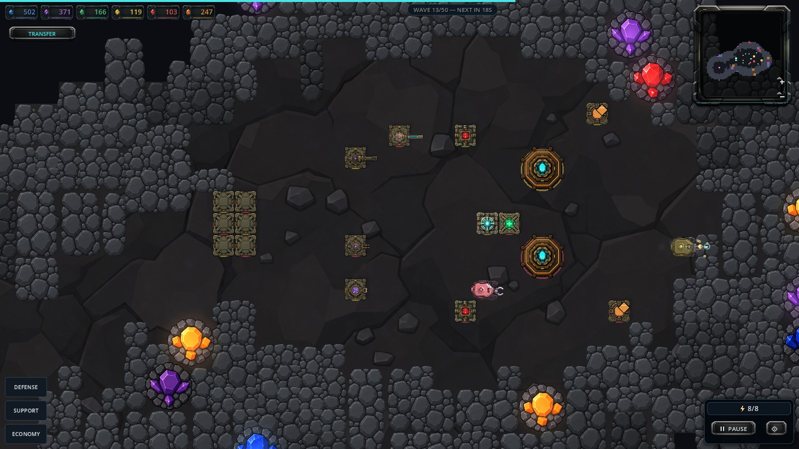 A powered base defended toward the hive while a worker expands the opposite side.